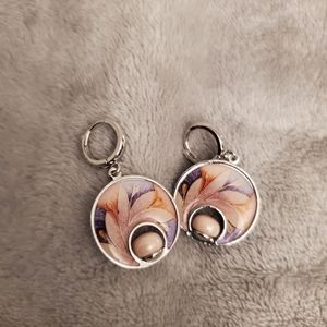 EARRINGS.  WITH DESIGN.